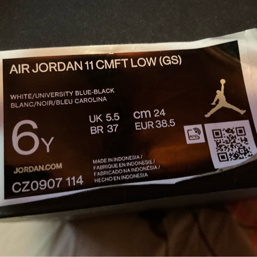 Jordan 11 CMFT Low in White, University Blue, and Black